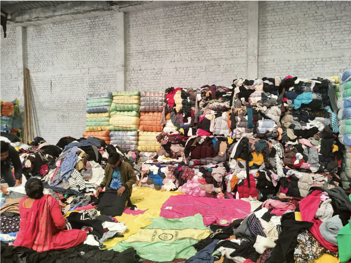 Women sorting textile waste in India